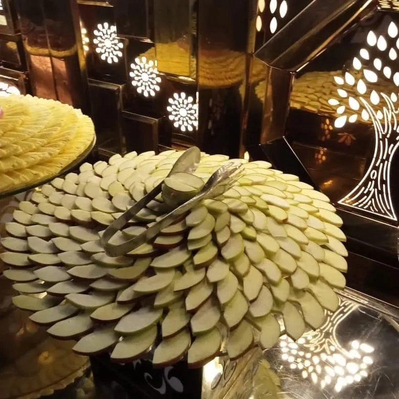 Apple slices arranged as a flower